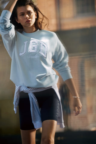 STUDIO LONGLINE SIGNATURE SWEATER BABY BLUE