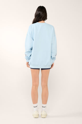 STUDIO LONGLINE SIGNATURE SWEATER BABY BLUE
