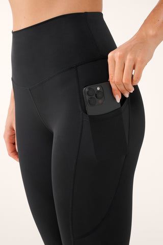 CLASSIC ANKLE BITER POCKET BASELINE LEGGING BLACK/BUTTER