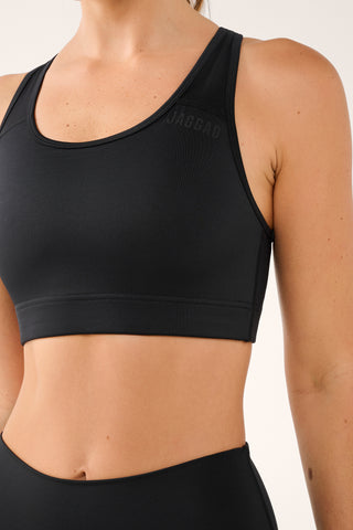 ESSENTIAL HIGH SUPPORT CROP TOP BLACK